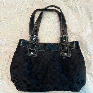 Coach purse with light blue interior